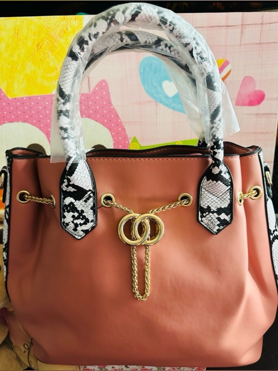 unbranded Handbags - Chic Pink Tote with Snake-Print Trim and Gold Chain Detail